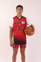 A boy in a red basketball jersey, 52 (2)