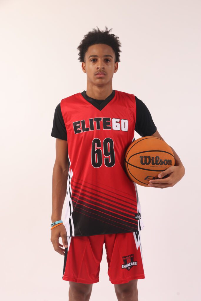 A boy in a red basketball jersey, 69 (2)