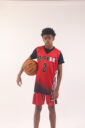 A boy in a red basketball jersey, 2