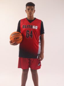 A boy in a red basketball jersey, 64
