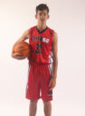 A boy in a red basketball jersey, 32