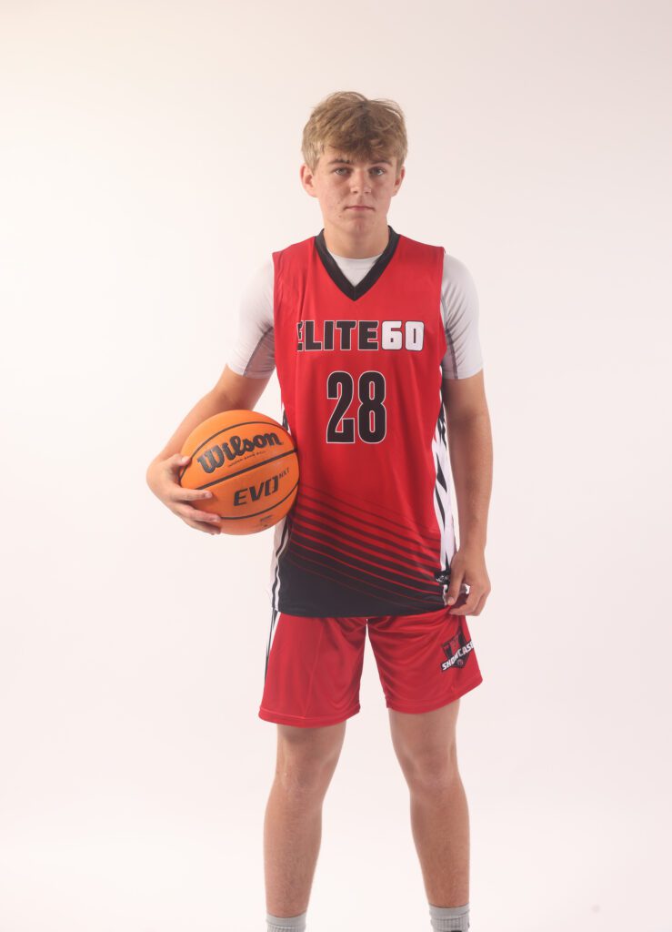 A boy in a red basketball jersey, 28