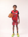 A boy in a red basketball jersey, 51