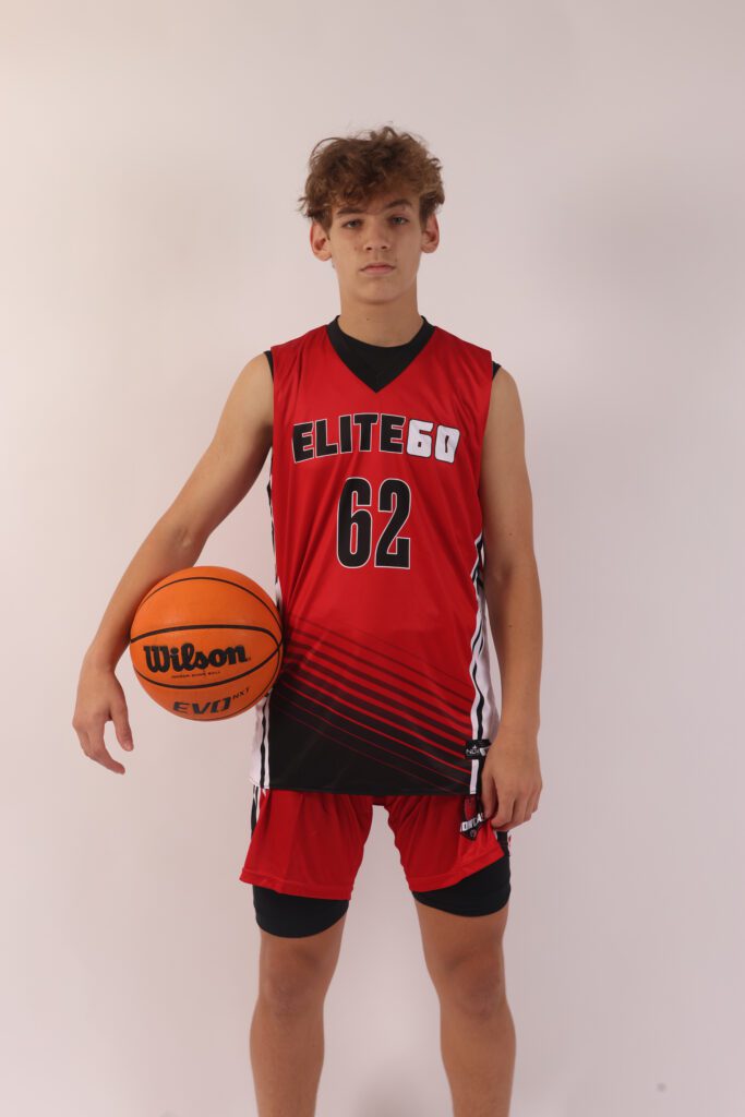 A boy in a red basketball jersey, 62