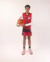 A boy in a red basketball jersey, 11