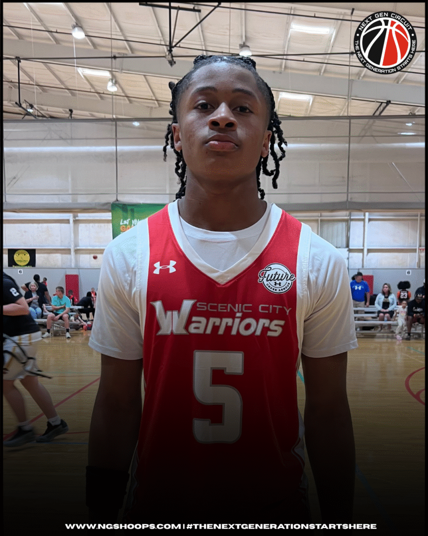 Young basketball player in red Warriors jersey number 5.