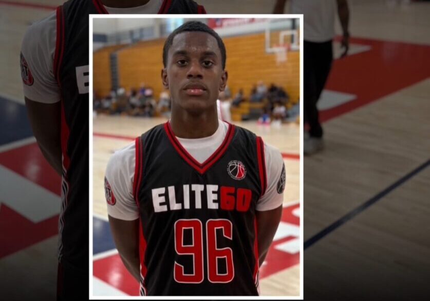 Young basketball player Braeden Greenup in Elite 80 jersey on court.