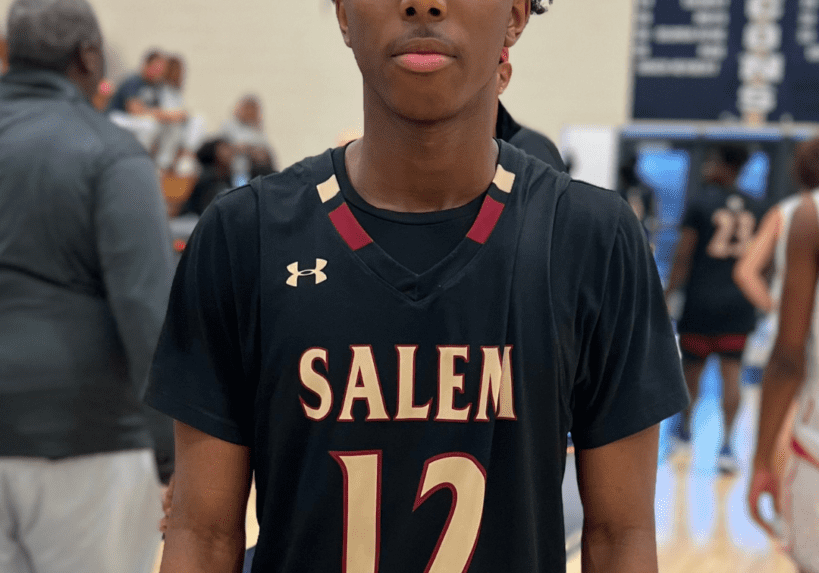 Young basketball player in Salem jersey number 12.